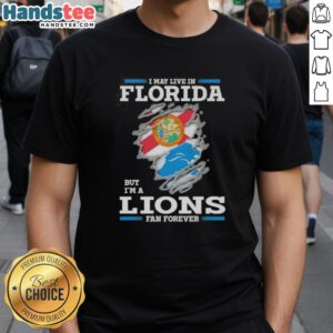 Awesome Lions fan T-shirt for Florida residents, featuring bold text: 'I May Live In Florida But I'M A Lions Fan Forever.'