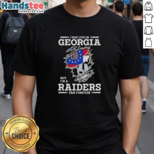 Awesome 'I May Live In Georgia But I'm A Raiders Fan Forever' T-Shirt showcasing team pride and unique style.