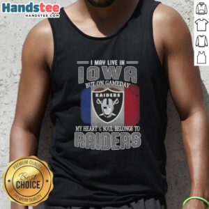 Alt Text: Woman in a Raiders tank top showing team spirit, saying 'I may live in Iowa, but my heart belongs to Raiders'.