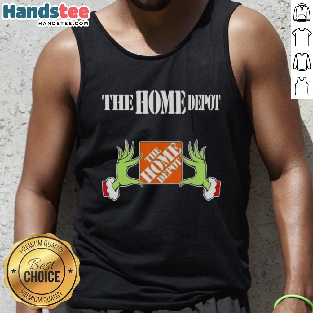 Festive Grinch hands with a heart, showcasing a Home Depot Christmas tank top, perfect for holiday cheer and style.