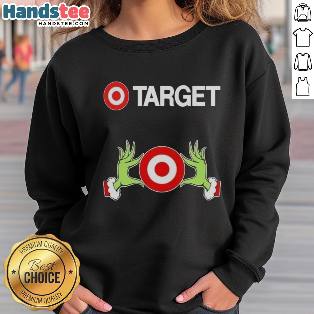 Premium Target X Grinch Hands Merry Christmas sweatshirt featuring festive design perfect for holiday celebrations.