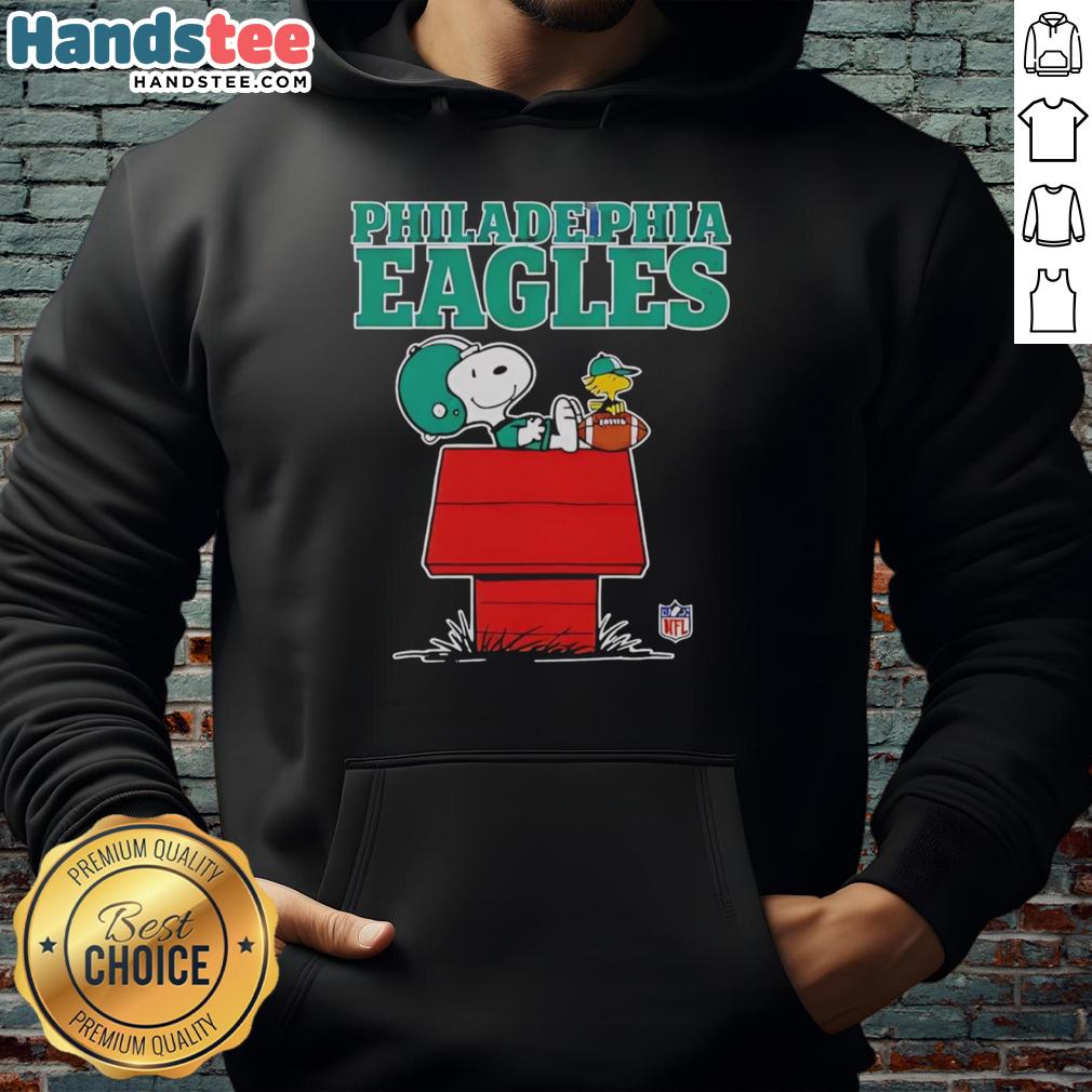 Alt Text: Snoopy in a Philadelphia Eagles hoodie, relaxing with a football in Peanuts style, perfect for Eagles fans.