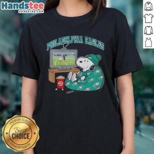 Awesome Philadelphia Eagles Snoopy cozy game day Peanuts style ladies tee featuring a fun graphic design.
