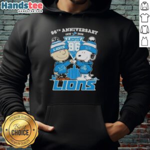 Alt Text: Cute Charlie Brown and Snoopy hoodie celebrating the 96th anniversary (1930-2026) with Detroit Lions football skyline.