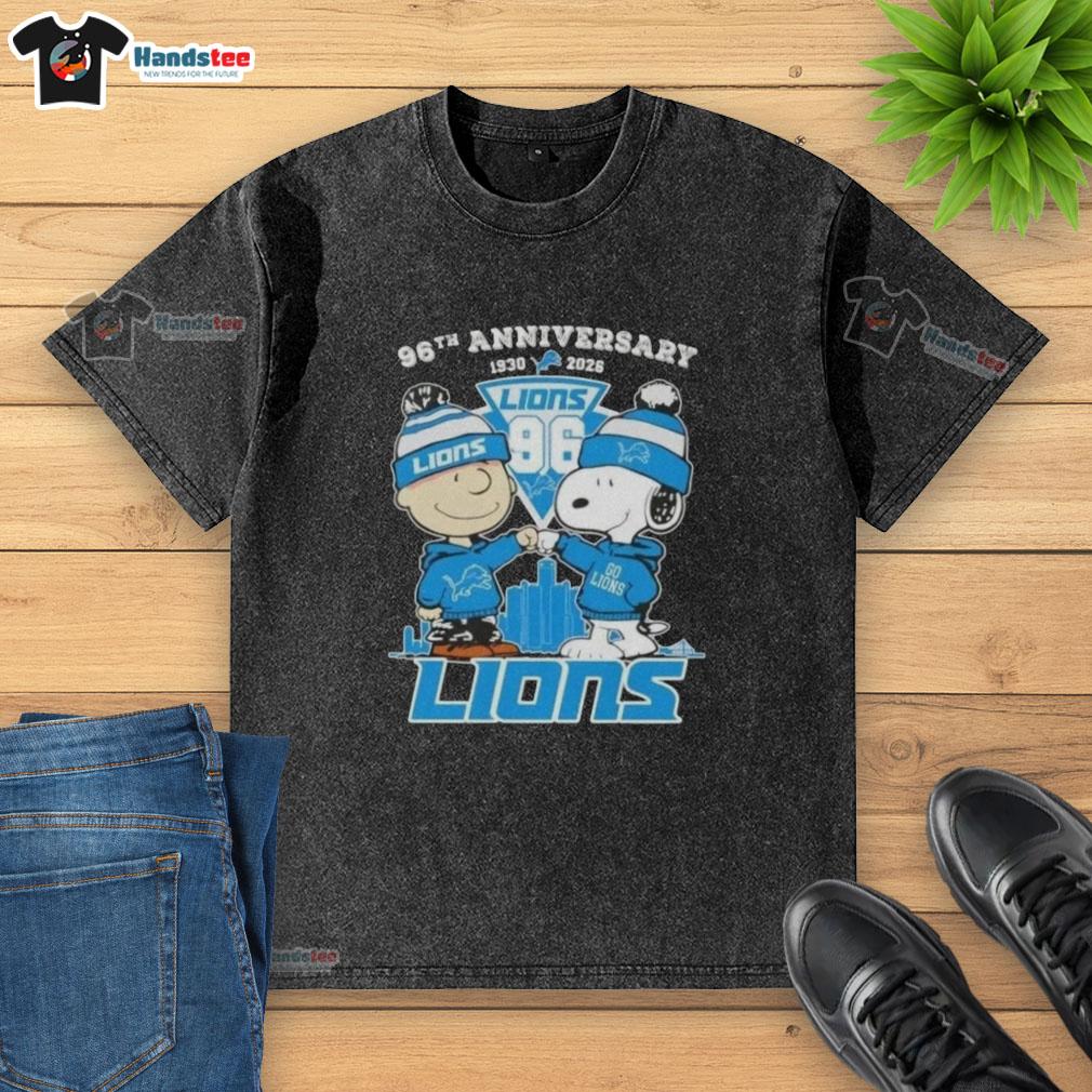 Alt Text: Cute Charlie Brown and Snoopy 96th Anniversary t-shirt featuring Detroit Lions skyline, perfect for fans.