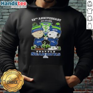 Cute Charlie Brown and Snoopy celebrate Super Bowl 52nd Anniversary on Seattle Seahawks hoodie with city skyline.