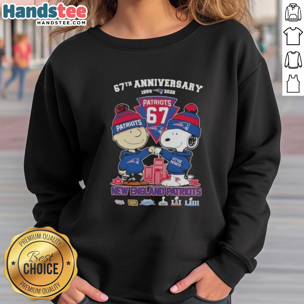 Alt Text: Cute Charlie Brown and Snoopy sweatshirt celebrating Super Bowl 67th Anniversary with New England Patriots skyline design.