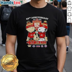 Alt Text: Cute Charlie Brown and Snoopy celebrate Super Bowl 82nd Anniversary on San Francisco 49ers football T-shirt design.