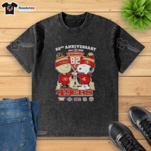 Cute Charlie Brown and Snoopy celebrate Super Bowl 82nd Anniversary on a San Francisco 49ers skyline washed t-shirt.
