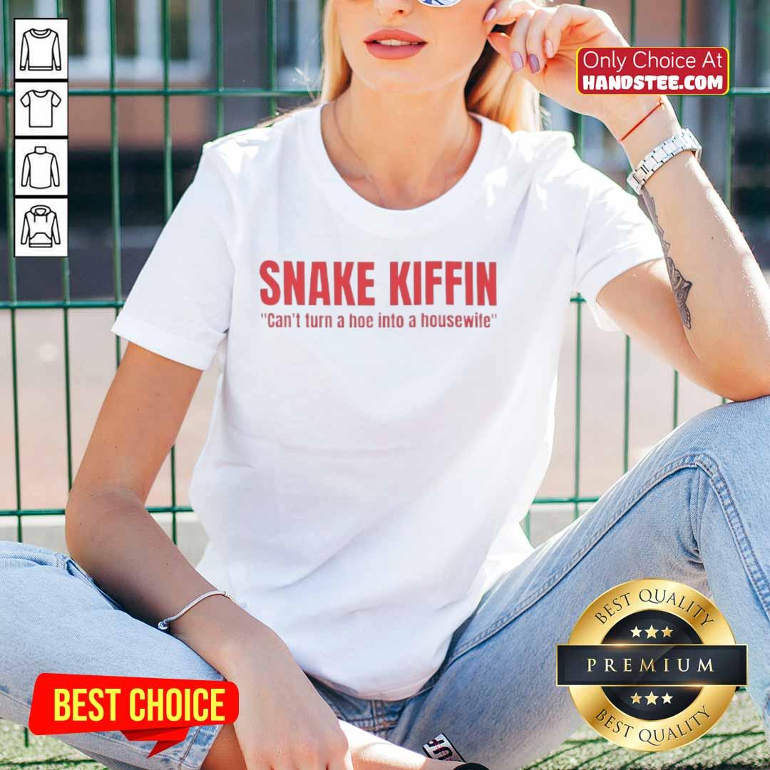 Alt Text: Funny snake graphic on 'Kiffin can't turn a hoe into a housewife' ladies tee, perfect for casual wear and humor.