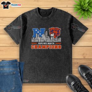Alt Text: Good 2025 NFC North Champions Chicago Bears washed t-shirt featuring city skyline and player names design.