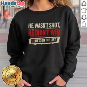 Cozy sweatshirt featuring 'He Wasn't Shot, He Didn't Win, He's On The List' text, perfect for casual wear and unique style.