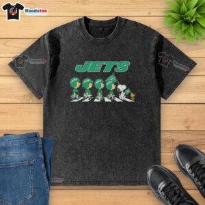 Good New York Jets X Peanuts Snoopy and Friends Abbey Road washed t-shirt featuring iconic characters in a playful design.