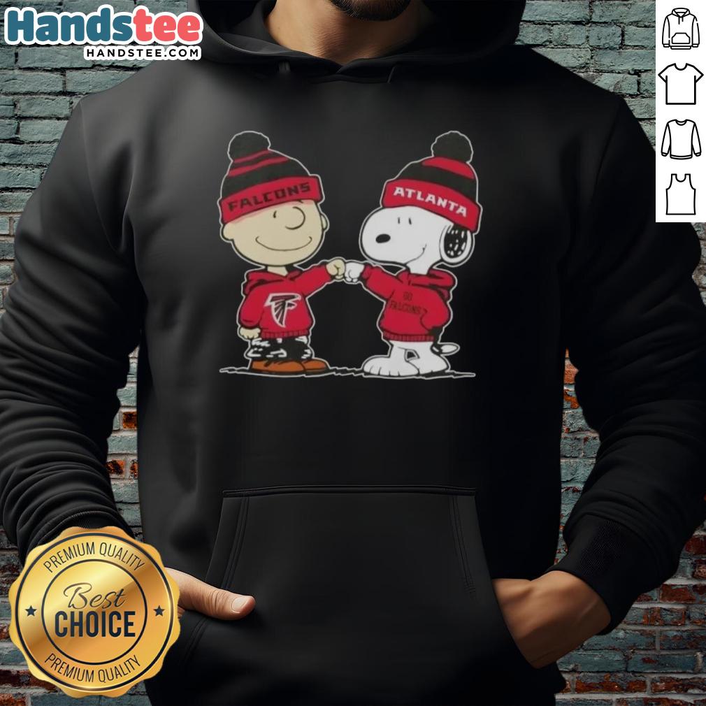 Alt Text: Charlie Brown and Snoopy fist bump in Atlanta Falcons hoodie, showcasing Good Peanuts collaboration and football spirit.