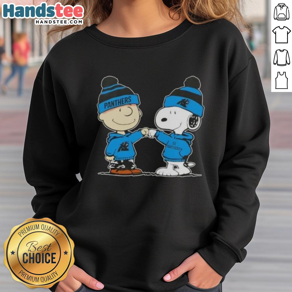 Charlie Brown and Snoopy fist bump on a Carolina Panthers football sweatshirt, showcasing Good Peanuts design.
