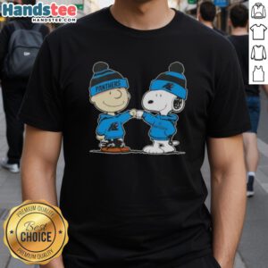 Good Peanuts Charlie Brown fist bump with Snoopy on Carolina Panthers football T-shirt design.
