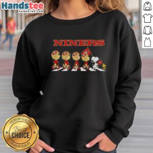 Good San Francisco 49ers x Peanuts Snoopy and Friends Abbey Road sweatshirt featuring iconic characters in a playful design.