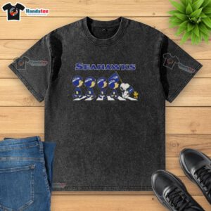 Alt Text: Good Seattle Seahawks X Peanuts Snoopy and Friends Abbey Road washed t-shirt featuring iconic characters in a fun design.