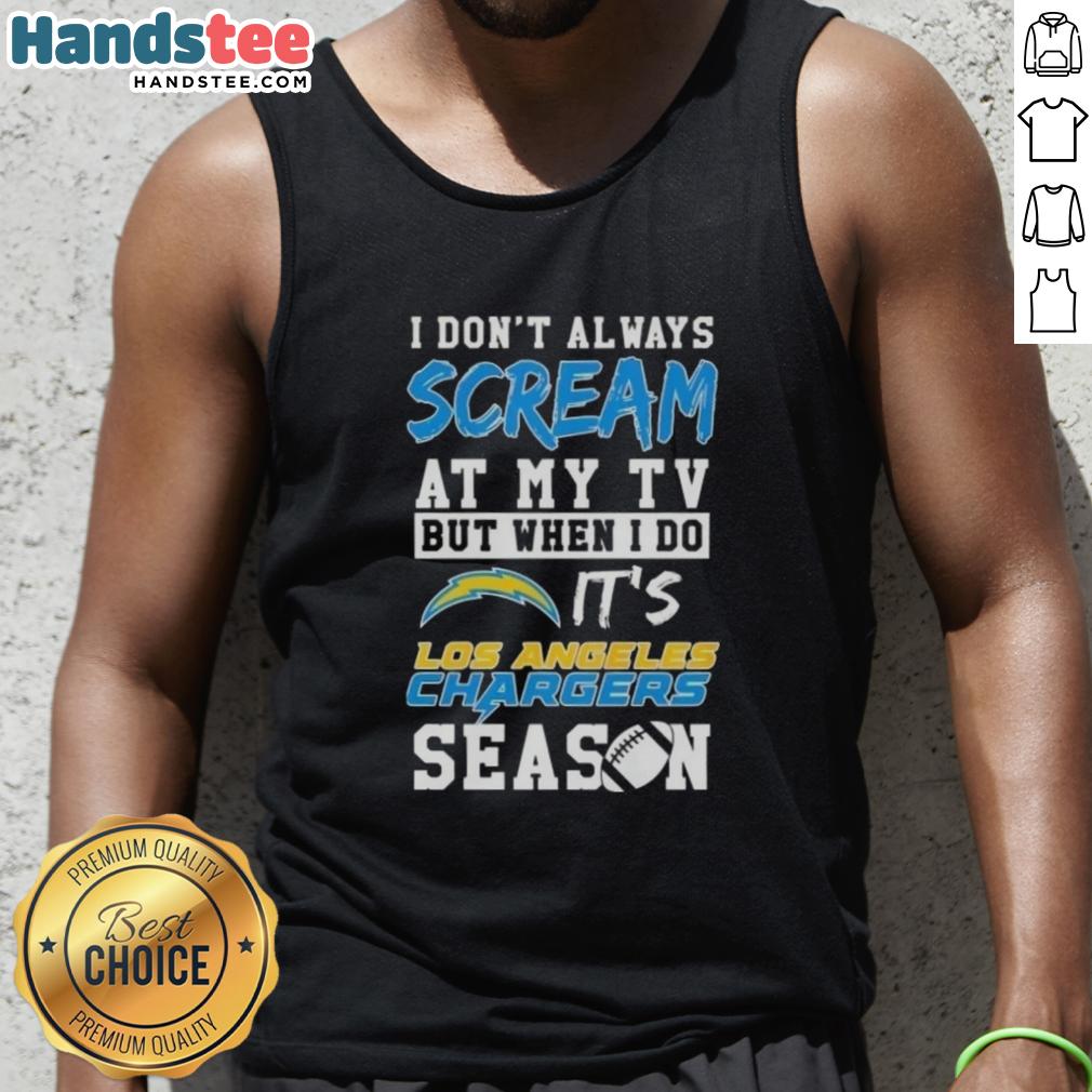 Alt Text: Happy fan wearing a Los Angeles Chargers season tank top, showcasing team spirit while watching a game.