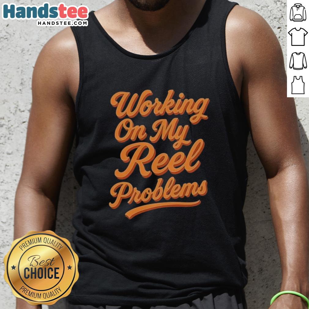 Happy person wearing a fishing tank top, working on reel problems with a smile, showcasing a love for fishing.