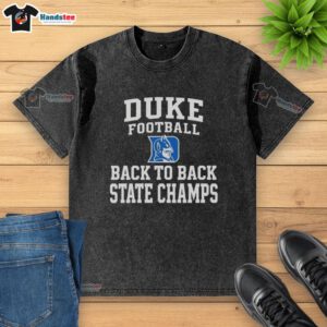 Alt Text: Hot Duke Blue Devils football back-to-back state champs washed t-shirt showcasing team pride and vintage style.