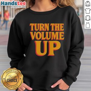 Alt Text: Stylish Hot Turn The Volume Up sweatshirt by Zohran Mamdani, featuring bold graphics and a trendy design.
