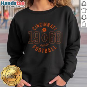 Vintage 1968 Cincinnati Football sweatshirt in white and red, featuring classic design and Whs logo for fans.