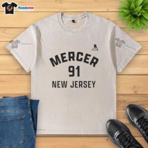 Alt Text: Nice Dawson Mercer New Jersey Devils ice hockey name and number 91 washed t-shirt displayed on a neutral background.