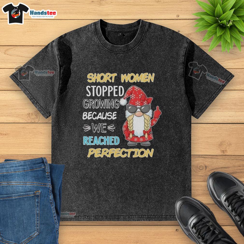 Alt Text: Short women in a cute gnome-themed washed t-shirt, showcasing a fun and playful style for petite fashion lovers.