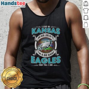 Alt Text: Die-hard Eagles fan wearing a tank top in Kansas, showcasing pride with a bold slogan: 'Win, Lose, or Tie, I'm a Fan'