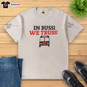 Alt Text: Nice in Bussi We Trussi Carolina Hurricanes washed t-shirt featuring team logo and stylish design for fans.