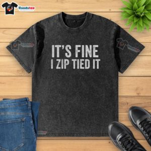 Vintage washed t-shirt featuring a mechanic car guy design with 'Nice, It's Fine, I Zip Tied It' text, perfect for auto enthusiasts.