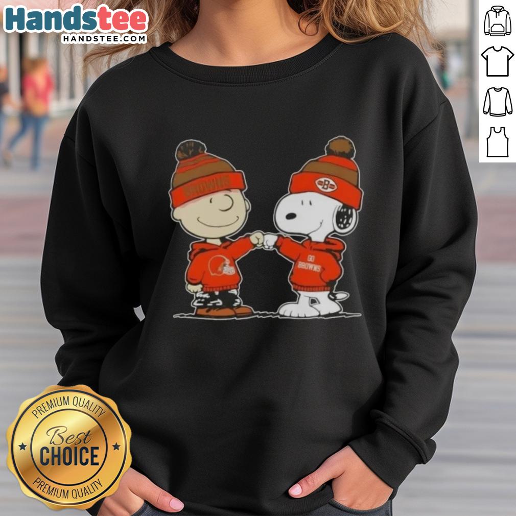 Charlie Brown and Snoopy fist bump in Cleveland Browns sweatshirt, showcasing a fun Nice Peanuts design for football fans.