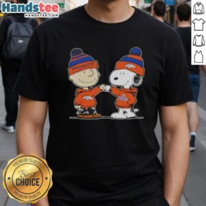 Nice Peanuts Charlie Brown fist bump with Snoopy on Denver Broncos football t-shirt, perfect for fans and collectors.