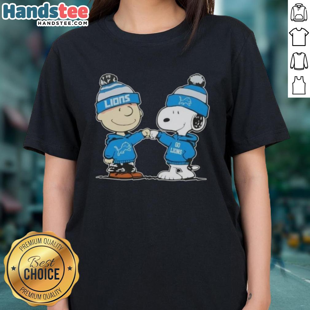 Charlie Brown and Snoopy fist bump in Detroit Lions ladies tee featuring nice peanuts design for football fans.
