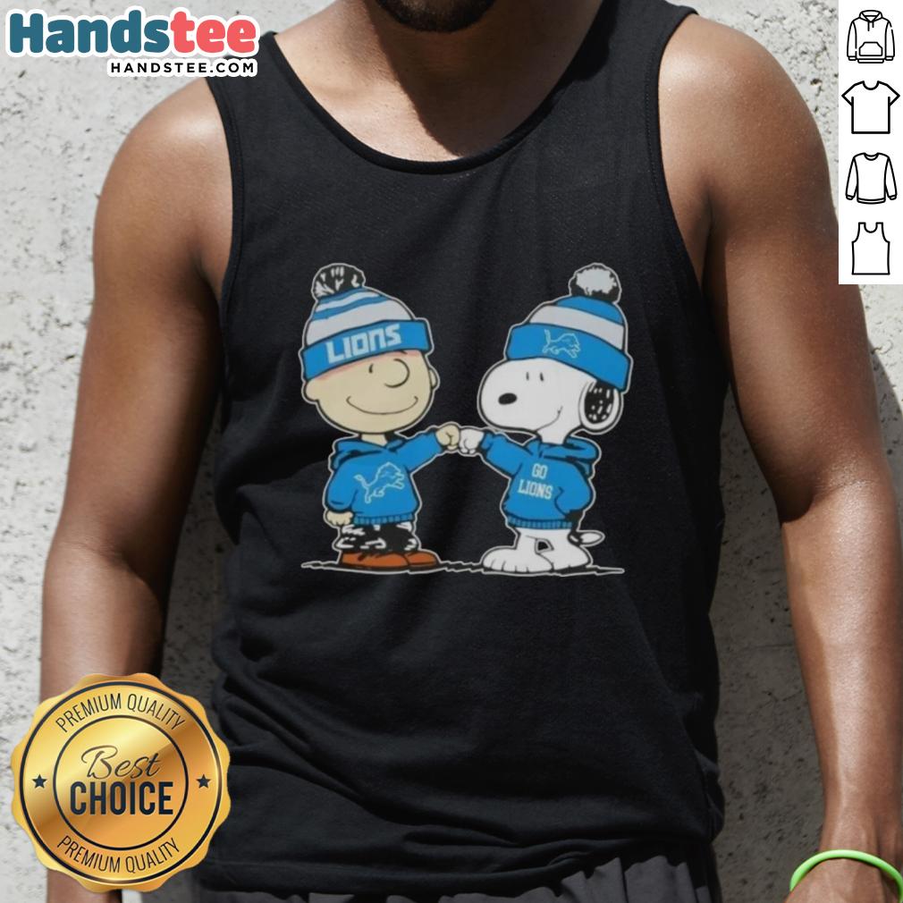 Charlie Brown and Snoopy fist bump in a Detroit Lions football tank top, featuring nice peanuts design.