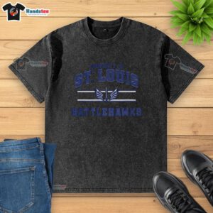 Alt Text: Stylish washed t-shirt featuring the St. Louis Battlehawks UFL logo and stripes, perfect for fans.