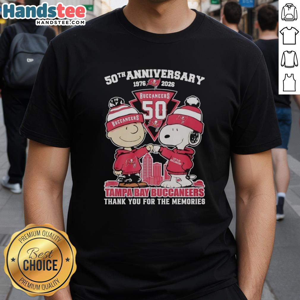 Stylish Tampa Bay Buccaneers outfit featuring a Snoopy and Charlie Brown 50th Anniversary T-shirt from 1976 to 2026.