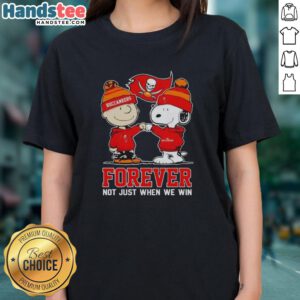 Nice Tampa Bay Buccaneers X Charlie Brown vs Snoopy Forever Ladies Tee, showcasing playful sports-themed design.