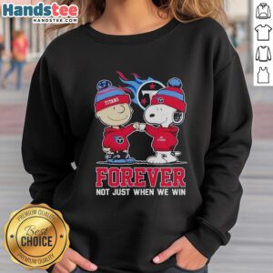 Alt Text: Nice Tennessee Titans x Charlie Brown sweatshirt featuring Snoopy with 'Forever, Not Just When We Win' slogan.