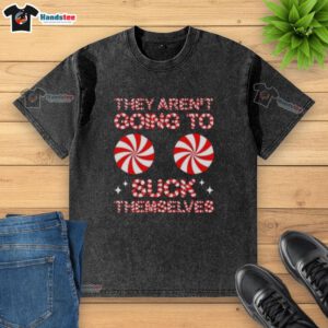 Funny Christmas washed t-shirt featuring 'Nice, They Aren't Going to Suck Themselves' candy design for holiday cheer.
