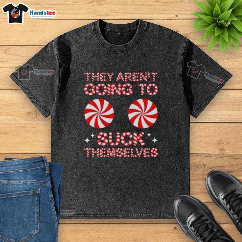 Funny Christmas washed t-shirt featuring 'Nice, They Aren't Going to Suck Themselves' candy design for holiday cheer.