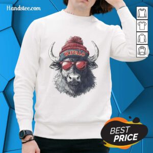 Alt Text: Official Buffalo Bills mascot sporting a beanie, sunglasses, and a sweatshirt, showcasing team spirit and style.