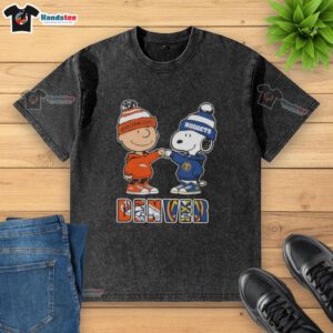 Official Charlie Brown fist bump with Snoopy on a Denver City Sports Broncos X Nuggets washed t-shirt design.