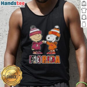 Official Charlie Brown fist bump with Snoopy on a Florida City sports Seminoles tank top, perfect for Tampa Bay Buccaneers fans.