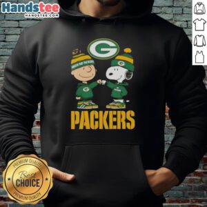 Alt Text: Official Charlie Brown fist bump with Snoopy on a Green Bay Packers hoodie, perfect for fans and cozy wear.