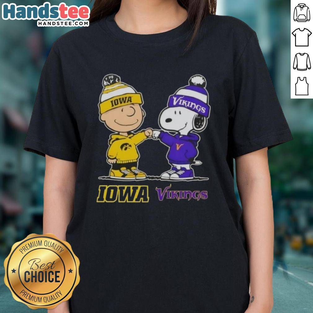 Official Charlie Brown fist bump with Snoopy on Iowa Hawkeyes x Minnesota Vikings ladies tee design.