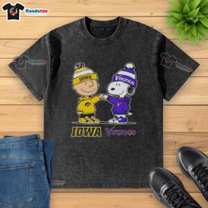 Alt Text: Official Charlie Brown fist bump with Snoopy on Iowa Hawkeyes x Minnesota Vikings washed t-shirt design.