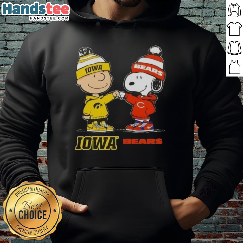 Official Charlie Brown fist bump with Snoopy on Iowa Hawks x Chicago Bears hoodie design, perfect for sports fans.