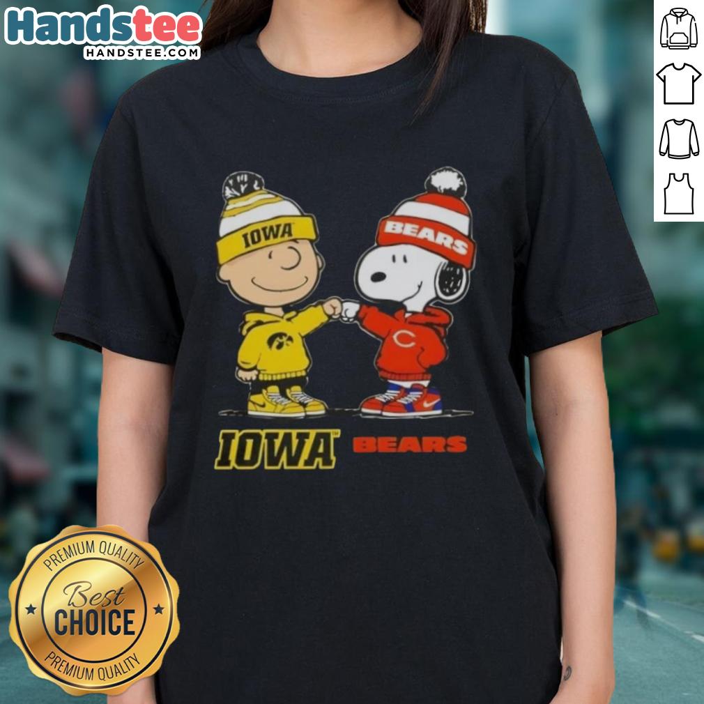 Official Charlie Brown fist bump with Snoopy on Iowa Hawks x Chicago Bears ladies tee, perfect for fans and casual wear.